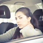Displeased girl in her car, traffic